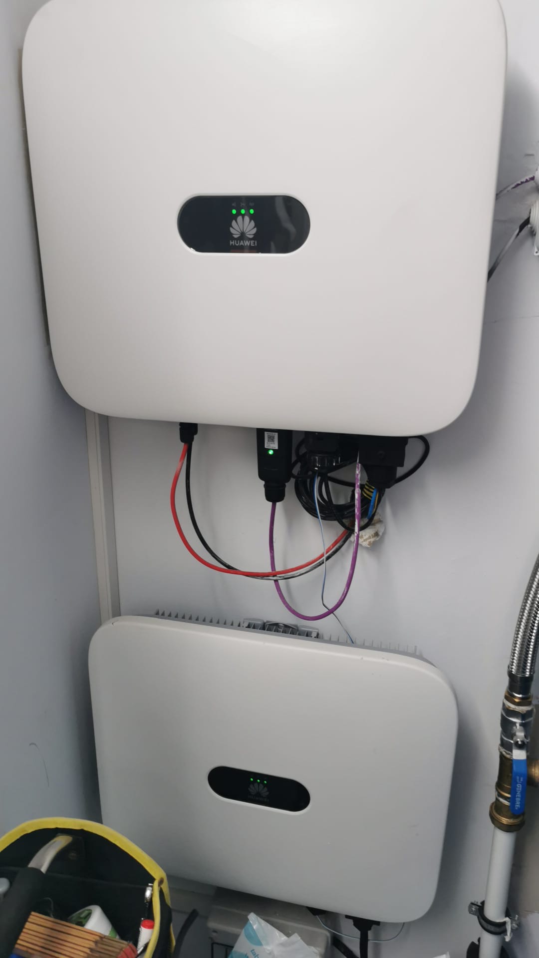 Huawei inverters with status lights checked during maintenance