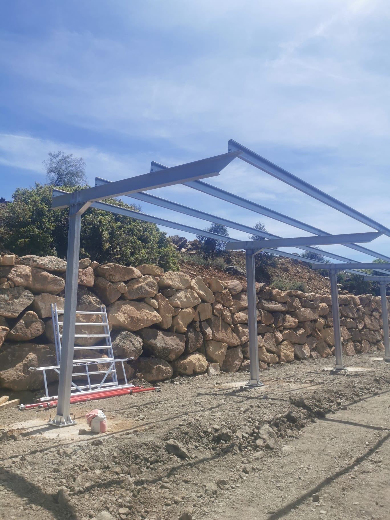 Solar carport supporting columns Cantueso Cottages